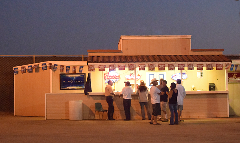 People at outdoor beer stand
