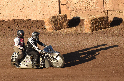 Motorcycle with sidecar on track