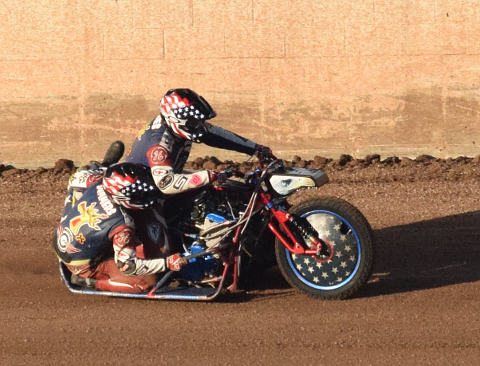 Motorcycle with sidecar on track