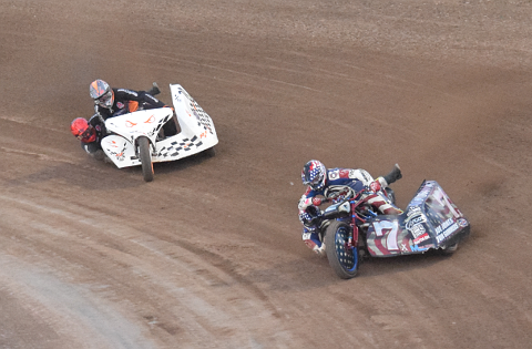 Motorcycles with sidecars on track