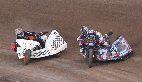 Motorcycles with sidecars on track