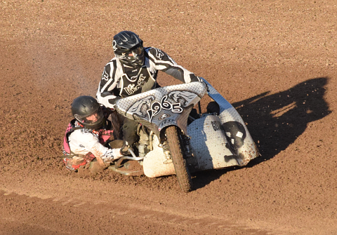 Motorcycle with sidecar on track