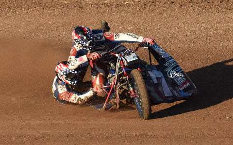 Motorcycle with sidecar on track