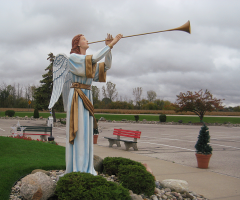 Statue of angel with trumpet