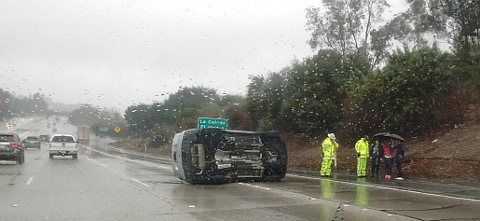 Overturned car on freeway