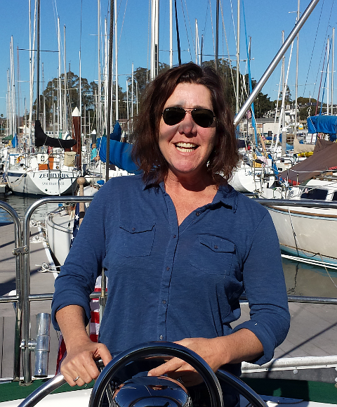 Stephanie steeing boat