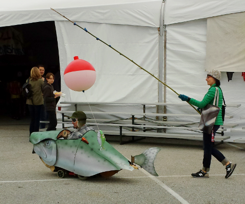 Little fish and fisherwoman