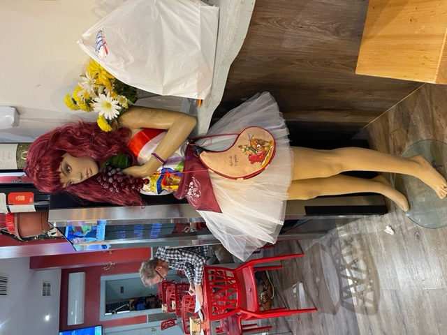 Maniquin with wine motif